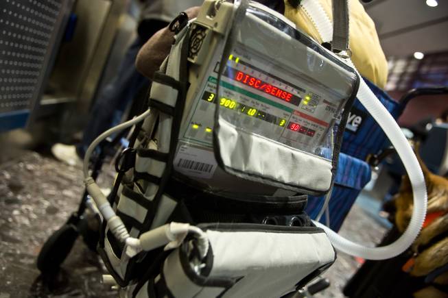 Amy Graves, who is quadriplegic and uses a wheelchair, depends on the Pulmonetic Systems LTV-950, a lightweight mobile ventilator, to breathe, Thursday, Feb. 5, 2014. Graves, who frequently visits Las Vegas throughout the year, was refused a seat on a return flight by Virgin Air because of her ventilator.
